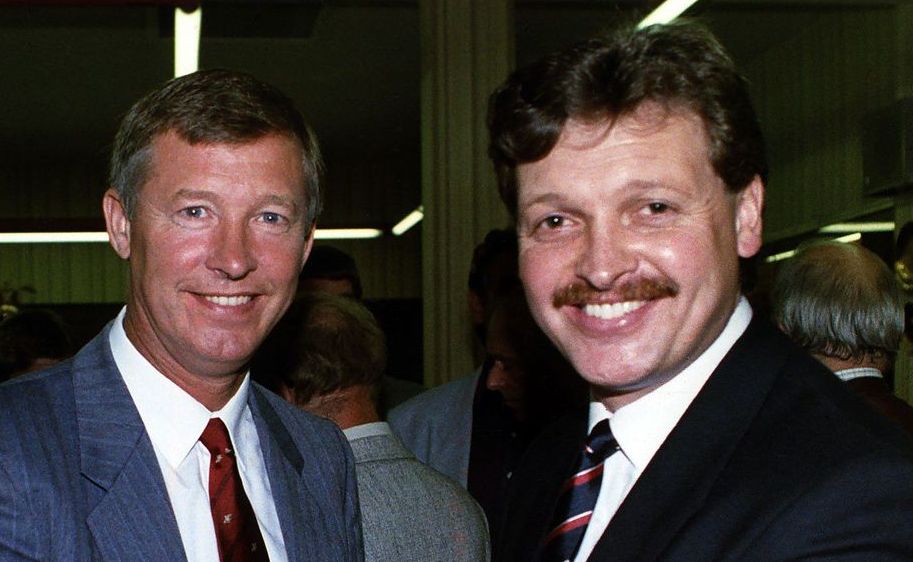 Michael Knighton shaking hands with Alex Ferguson